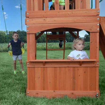 Atlantis Cedar Wood Swing Set with Wave Slide, Clubhouse, Rock Wall, and Sandbox Area - Image 9