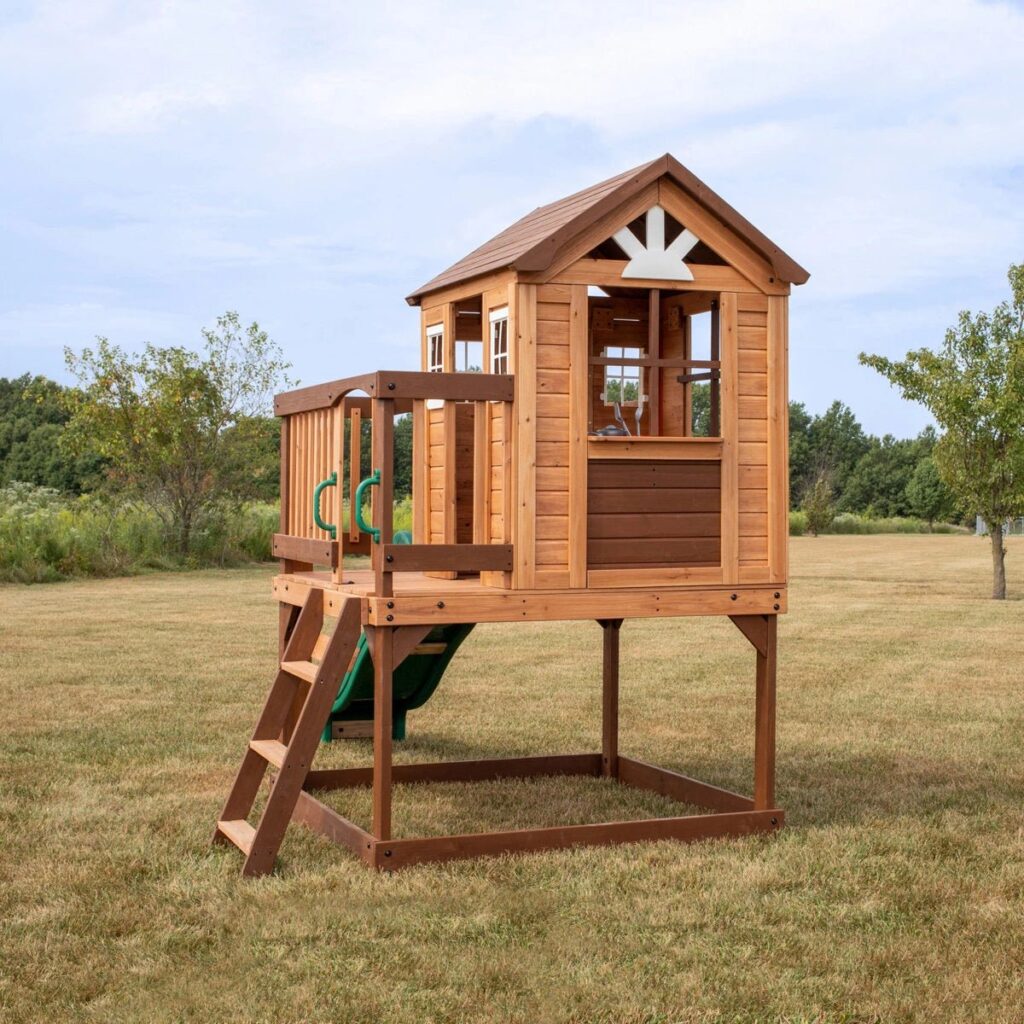 Heights Cedar Wooden Elevated Kids Playhouse with Wave Slide, Play Kitchen, and Deck